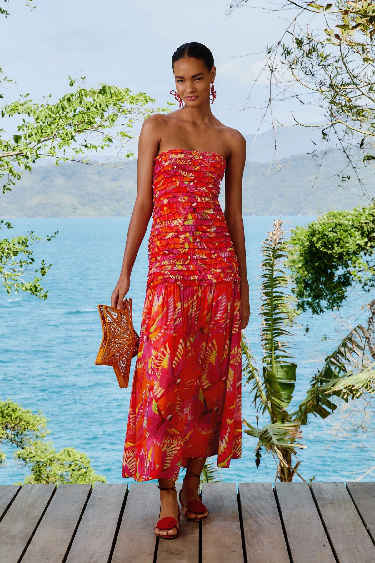 Orange flying birds strapless midi dress